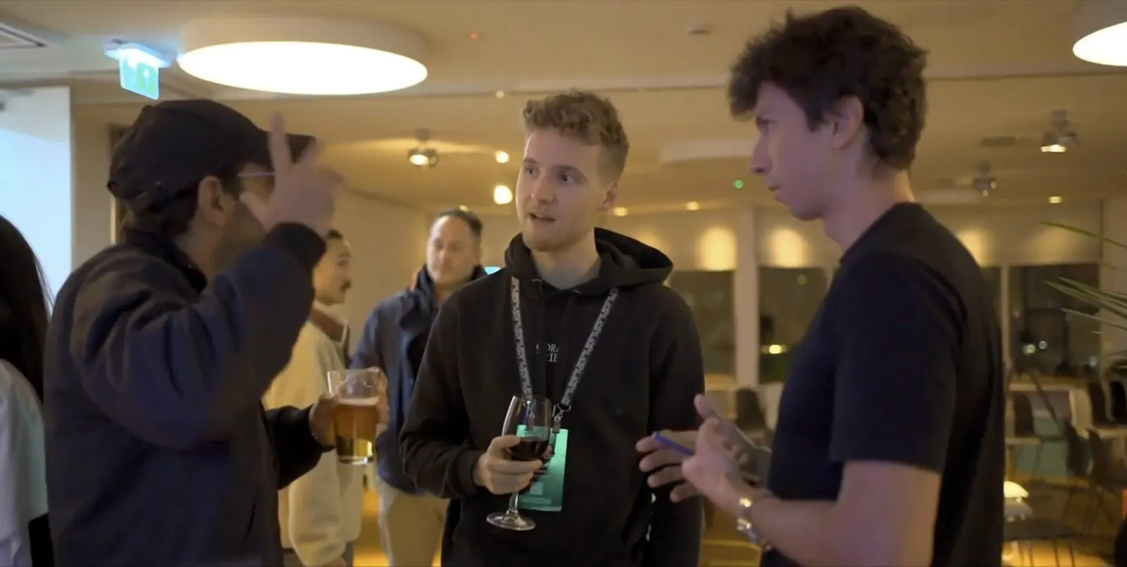 Builders networking at a Solana Impact gathering